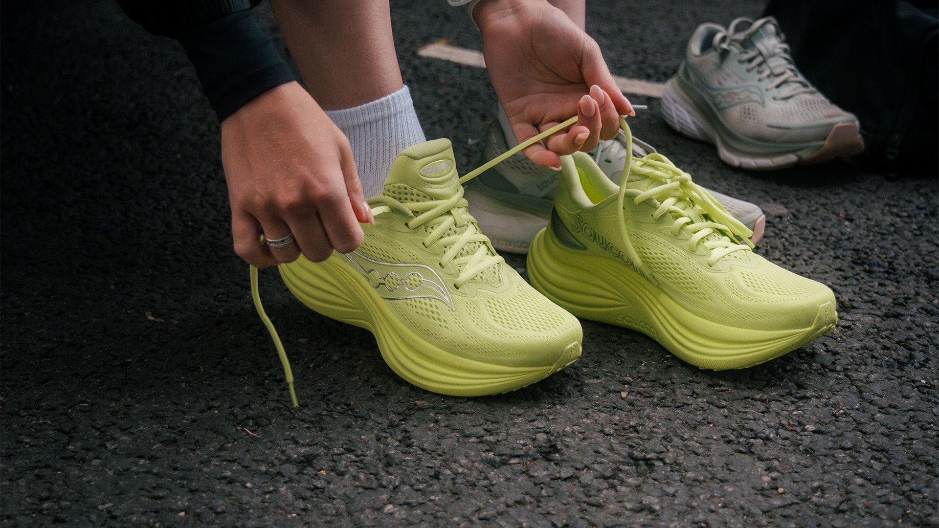 A runner wearing supportive road running shoes